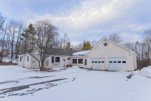 single story home featuring a garage