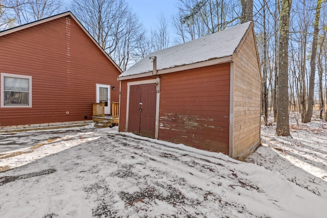 view of snow covered garage