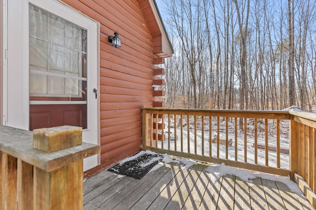 view of snow covered deck