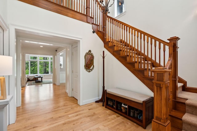 stairway featuring hardwood / wood-style flooring