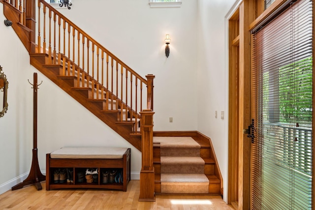 staircase featuring hardwood / wood-style floors