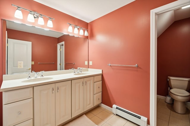 bathroom with vanity, a baseboard radiator, tile patterned floors, and toilet