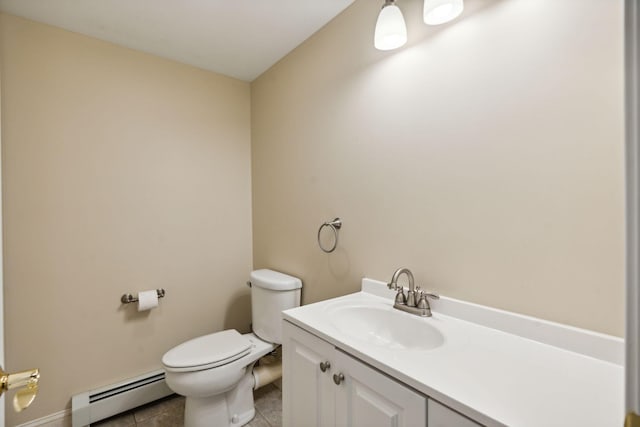 bathroom featuring tile patterned floors, a baseboard radiator, vanity, and toilet