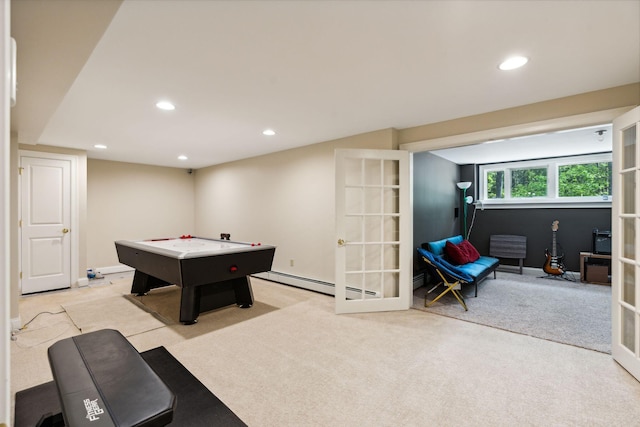 game room with french doors and light carpet