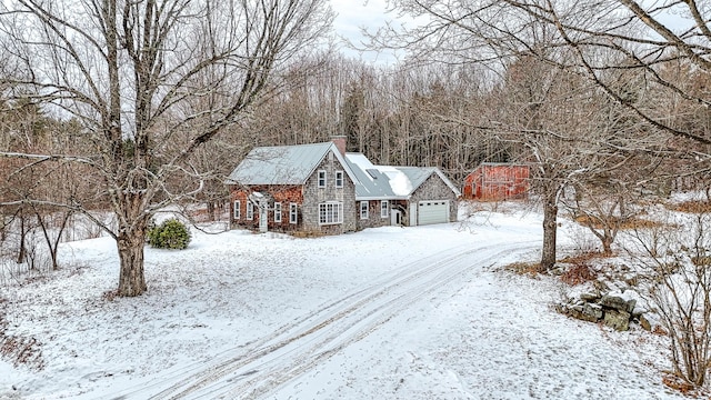 view of front of property with a garage