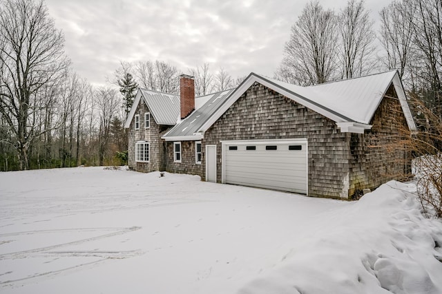 exterior space with a garage