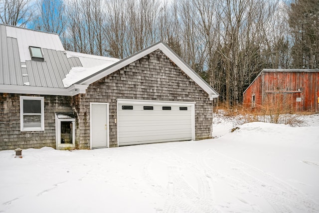 view of snow covered garage