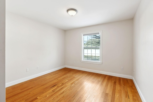 empty room featuring hardwood / wood-style flooring