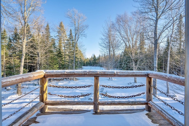 view of snow covered deck