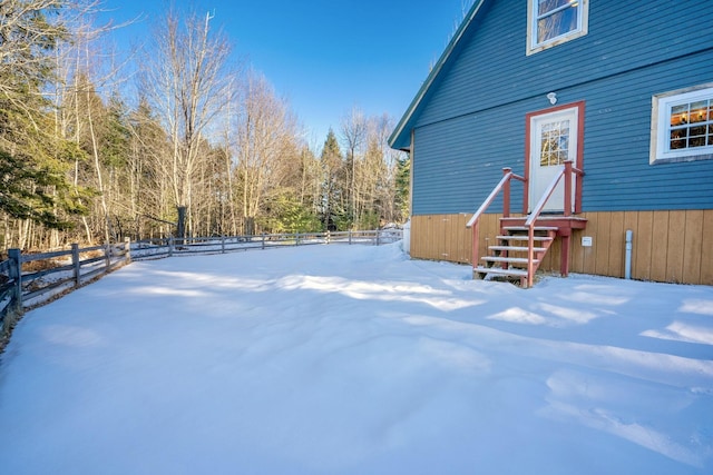 view of yard covered in snow