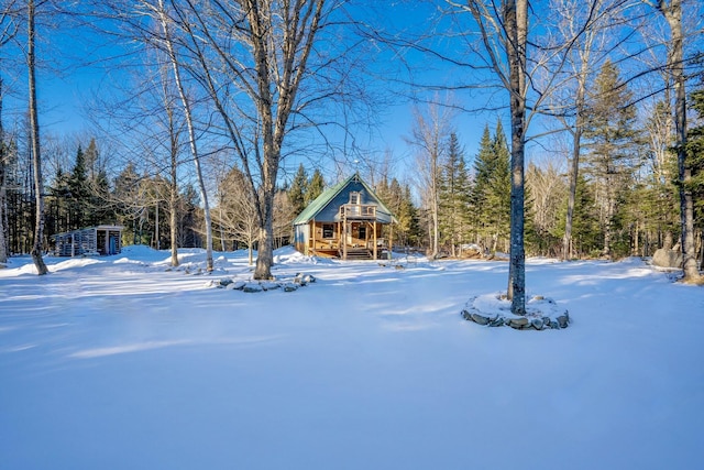 view of yard covered in snow