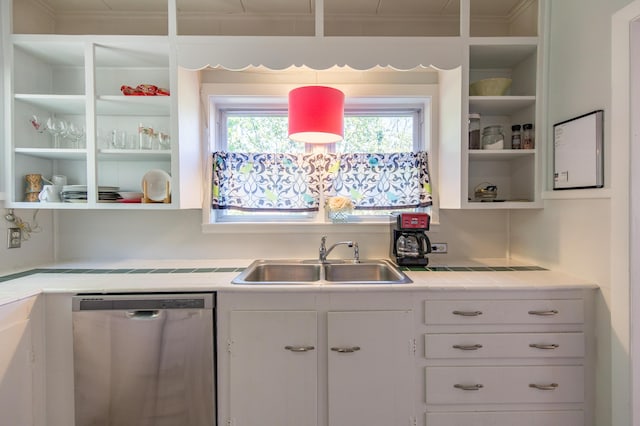 kitchen featuring a sink, dishwasher, white cabinetry, and open shelves