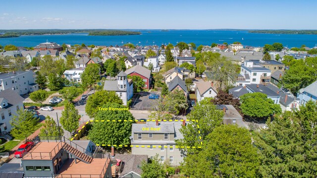 aerial view with a residential view and a water view