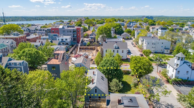 birds eye view of property featuring a residential view and a water view