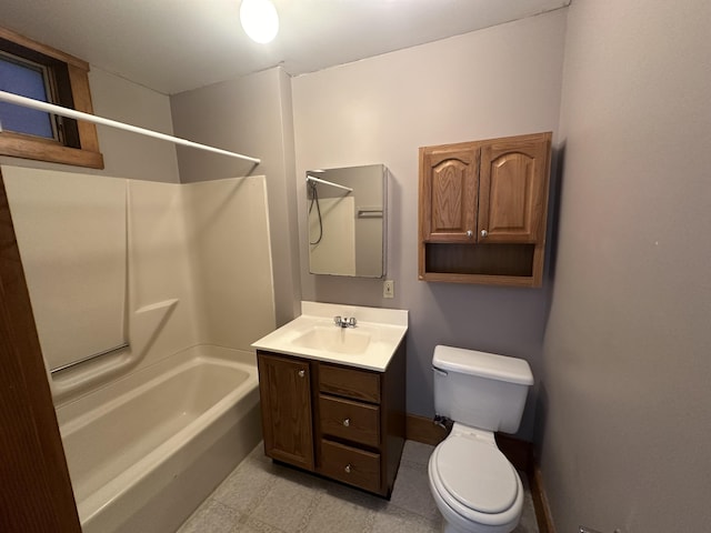 full bathroom featuring shower / bath combination, vanity, and toilet