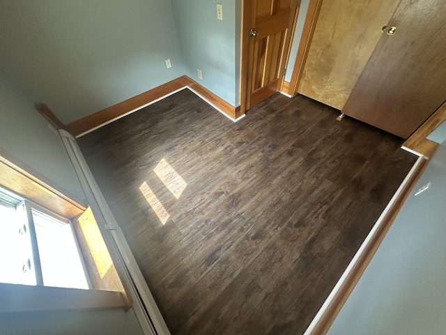 interior details featuring hardwood / wood-style flooring