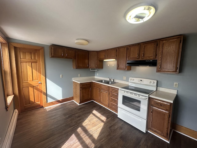 kitchen featuring dark hardwood / wood-style floors, electric stove, a baseboard radiator, and sink