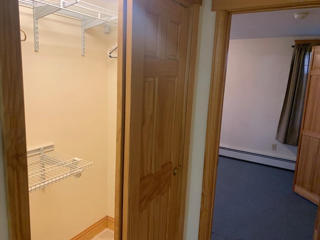 bathroom featuring a baseboard heating unit