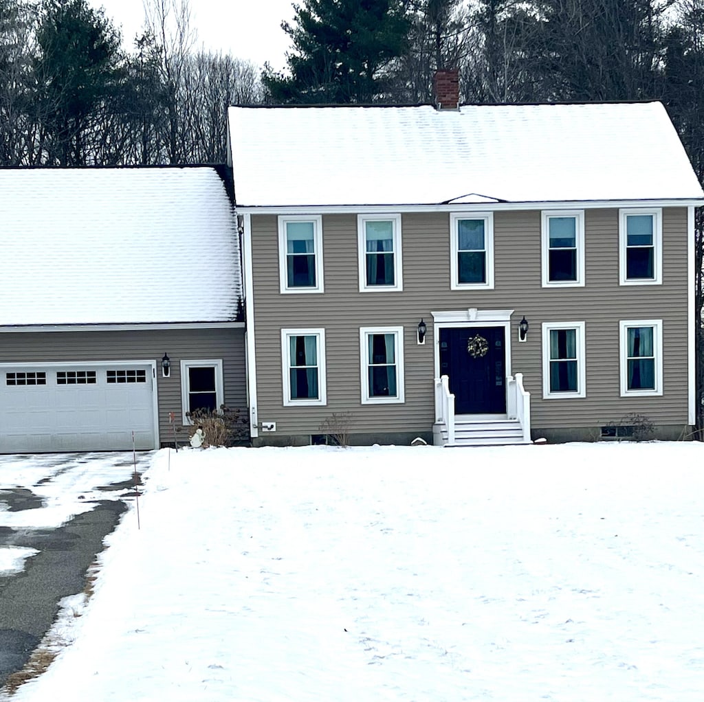 view of front of home with a garage