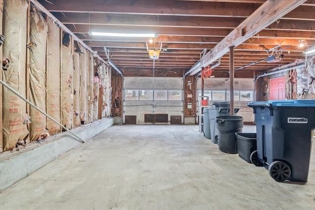 garage featuring a garage door opener