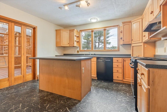 kitchen with a textured ceiling, black appliances, light brown cabinets, a kitchen island, and sink