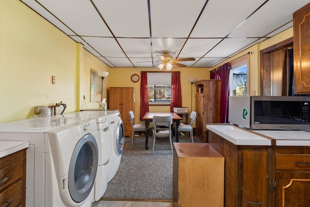 washroom with ceiling fan and washing machine and clothes dryer