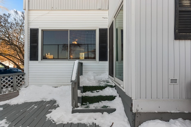 view of snow covered deck