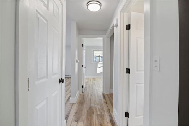 hall featuring light hardwood / wood-style flooring