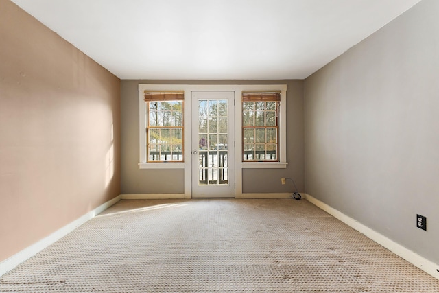 view of carpeted spare room