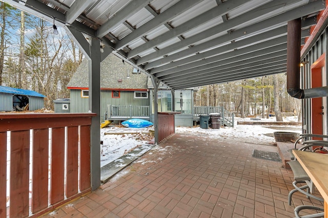 view of snow covered patio