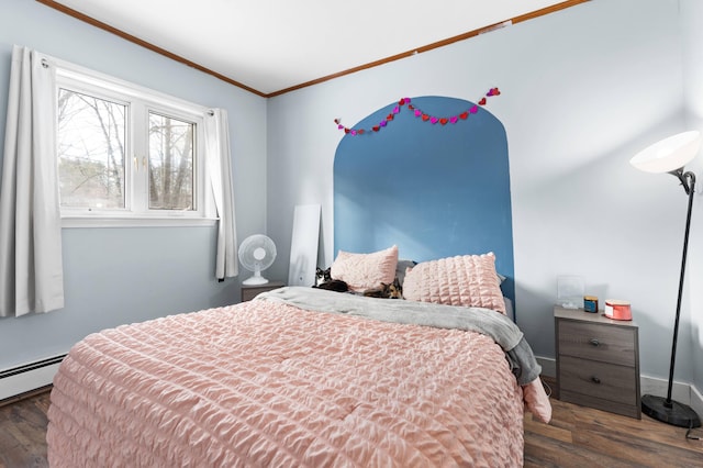 bedroom featuring dark hardwood / wood-style flooring, a baseboard radiator, and crown molding