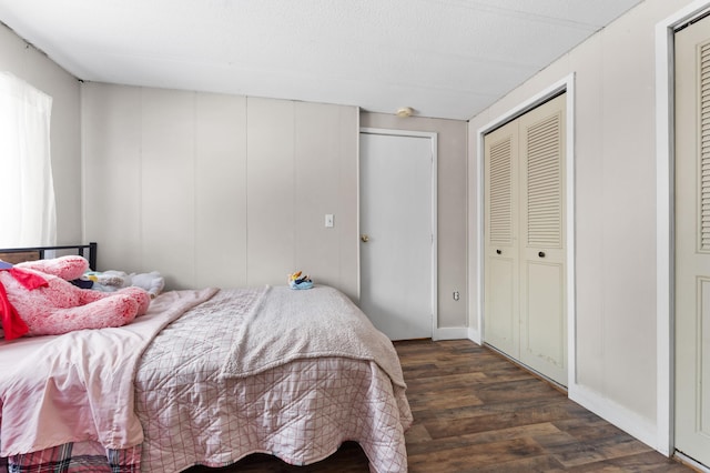 bedroom featuring dark wood-type flooring