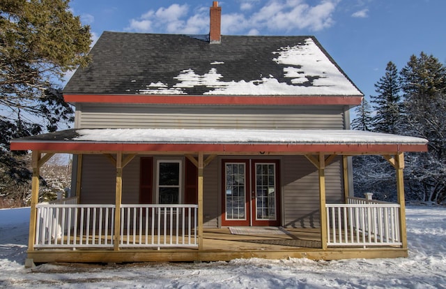 farmhouse-style home featuring a porch