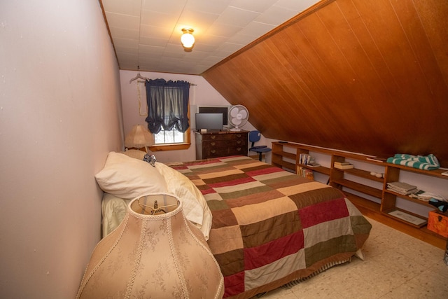 bedroom with lofted ceiling