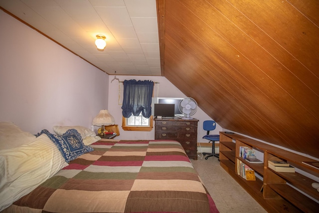 bedroom with a baseboard heating unit