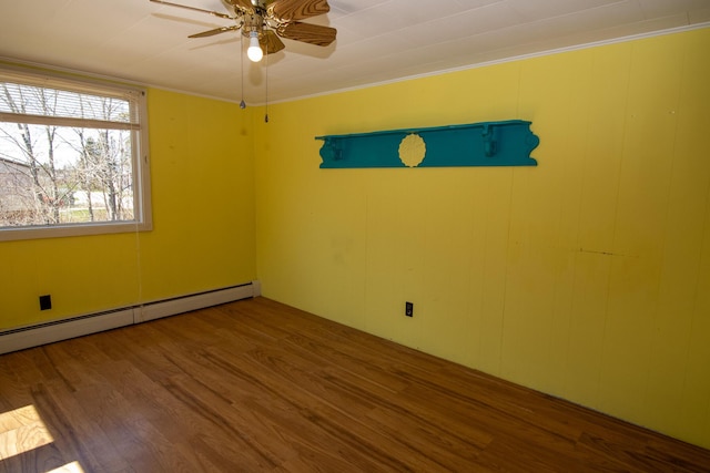 20 Cottage St, Milbridge, ME 04658 - unfurnished room with ceiling fan, baseboard heating, and wood finished floors