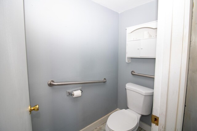 20 Cottage St, Milbridge, ME 04658 - bathroom with toilet and baseboards