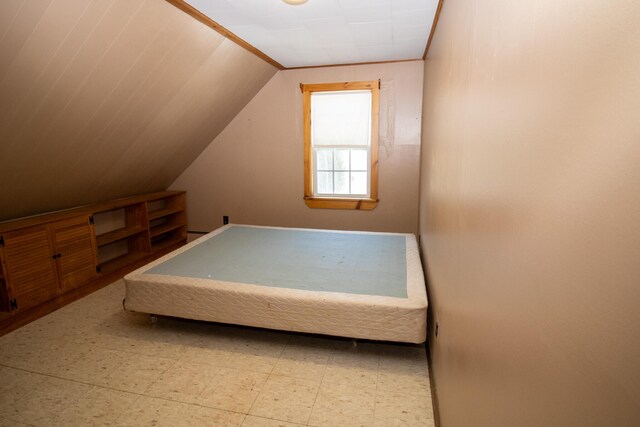 20 Cottage St, Milbridge, ME 04658 - bedroom with tile patterned floors and lofted ceiling