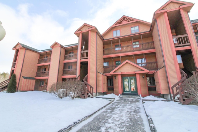 view of snow covered property