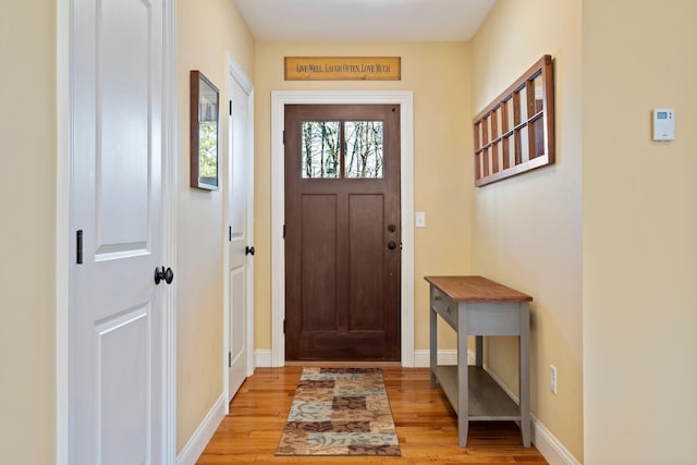 doorway featuring light wood-type flooring