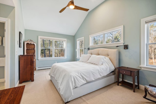 carpeted bedroom with ceiling fan, a baseboard heating unit, and lofted ceiling