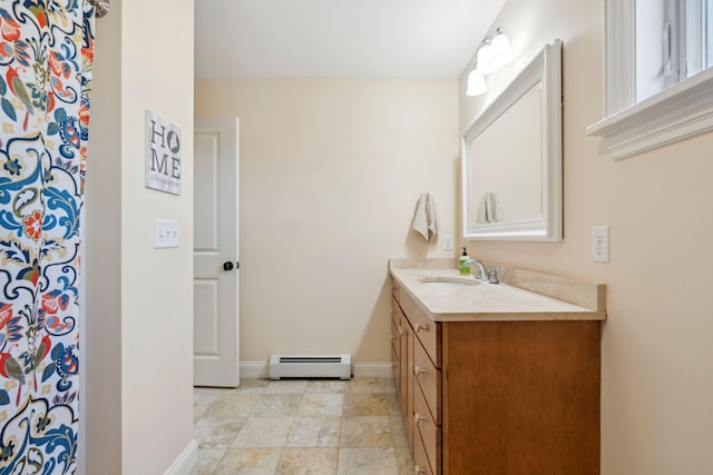 bathroom featuring vanity and a baseboard radiator