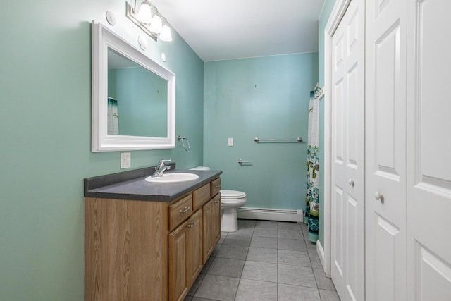 full bath with tile patterned floors, vanity, toilet, and a baseboard heating unit