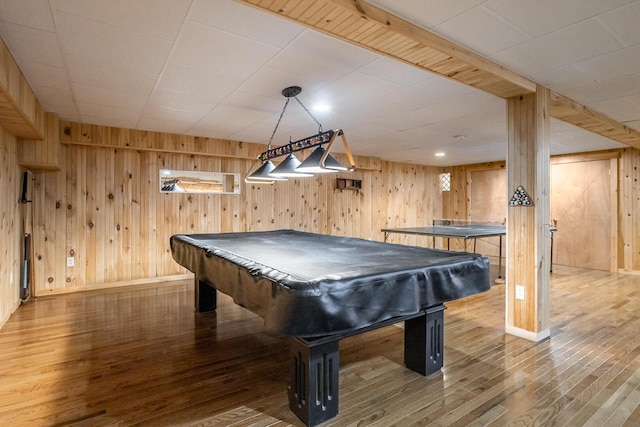 recreation room featuring baseboards, wood finished floors, billiards, and wood walls