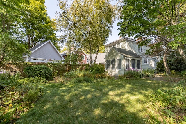 view of yard with a garage