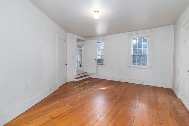 unfurnished bedroom with wood-type flooring