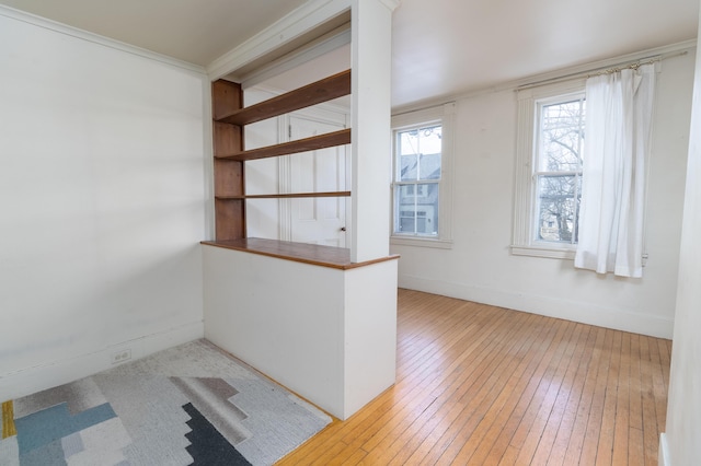 unfurnished room with hardwood / wood-style floors