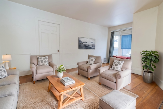 living room with light hardwood / wood-style flooring