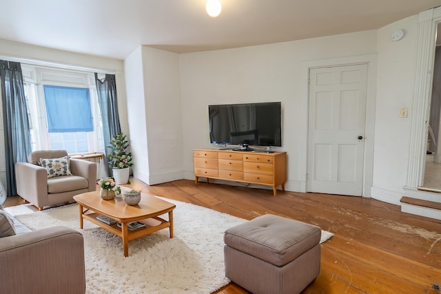 living room with hardwood / wood-style floors