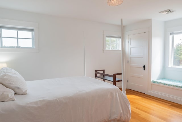 bedroom featuring light wood-style flooring